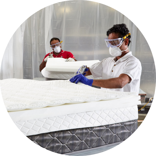 Kozynap mattress manufacturing process with experts assembling high quality foam layers in factory