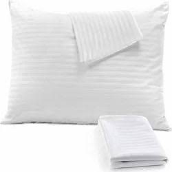 Pillow with striped cover and folded pillowcase