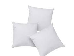 Trio of white cushions